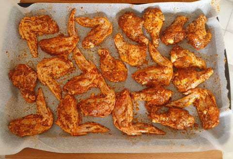 spicy chicken wings on tray