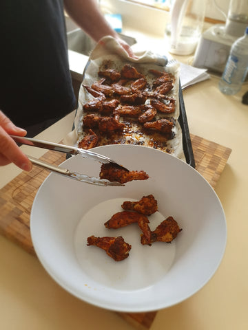 spicy chicken wings in bowl