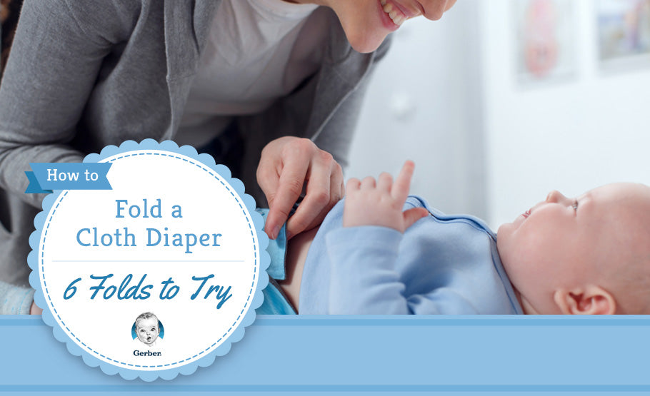 In this heartwarming image, a woman lovingly holds her baby as she shows you the step-by-step process of folding a cloth diaper into six perfect folds.