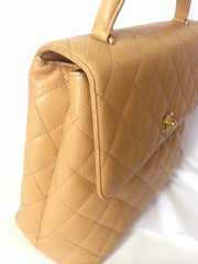 Reserved for tl. Vintage CHANEL beige caviar leather kelly handbag with golden CC closure. Classic purse