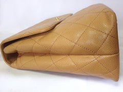 Reserved for tl. Vintage CHANEL beige caviar leather kelly handbag with golden CC closure. Classic purse