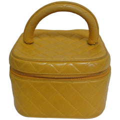 Vintage CHANEL yellow quilted lambskin cosmetic, make up case, vanity bag with CC mark at bottom. Can be a mini handbag. Get a lucky color