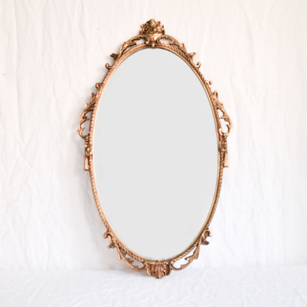 VINTAGE 'CAMILLE' LARGE OVAL BRASS MIRROR