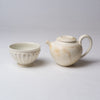 Yuko Matsuzuka, Round teapot in cream glaze flecked with ochre