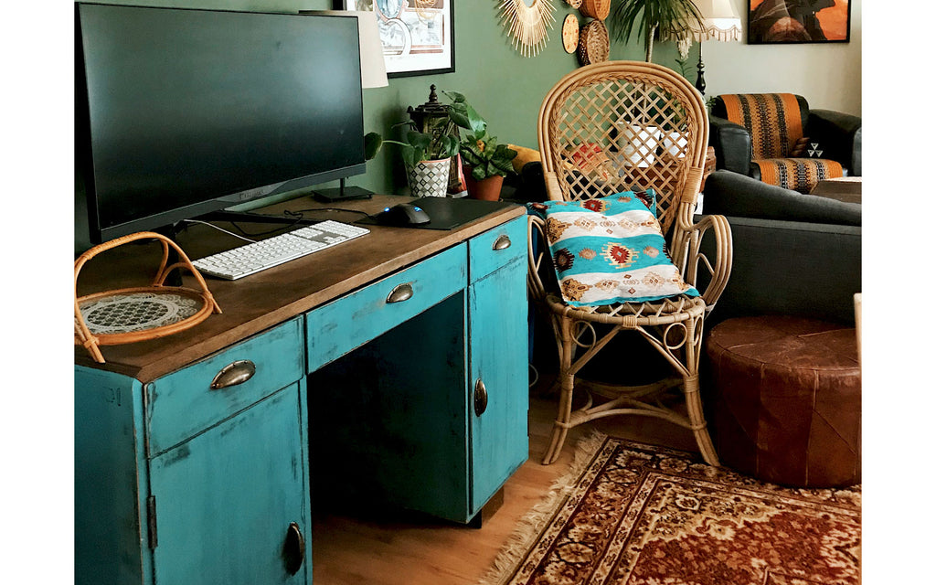 Eclectic boho apartment. Renovated vintage desk and rattan chair | House Tour on The Inkabilly Blog