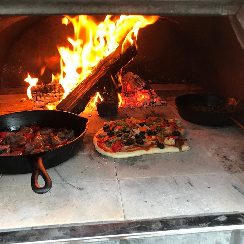 Pizza and Steak Cooked in Pizza Oven