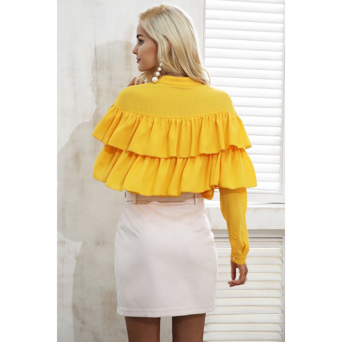 The Amalia Zipper Mini Skirt features an asymmetrical zipper design and belt on soft suede like material for a motorcycle fashion style skirt.