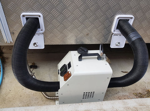 VVKB Portable Diesel Heater connected to van