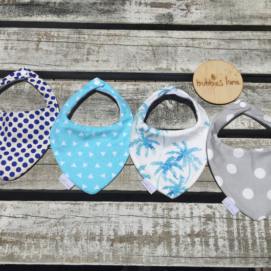 Royal blue dots, aqua tri, aqua palms, grey dot bandana bibs
