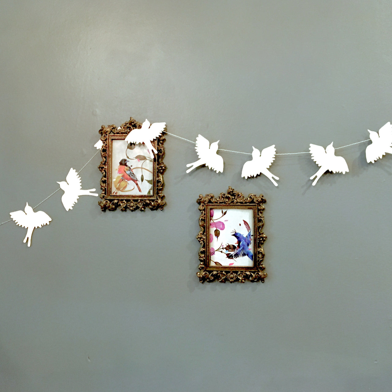 Swallow Silhouette Garland shown on wall