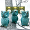 Owl Metal Note Keeper shown holding stamps