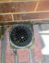 illegal overflow relief gully allowing rain water to flow into the sewer system