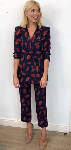 Holly Willoughby wearing orange and navy feather print trouser suit by Bozena Jankowska