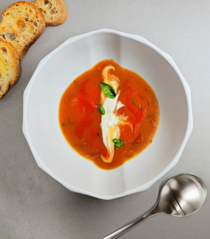 Tomato Basil Bisque with a swirl of creme fraiche & a hit of hot sauce