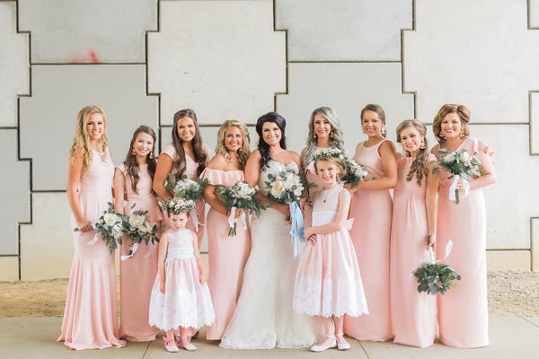 Elizabeth's bridesmaids in various gown in light pink