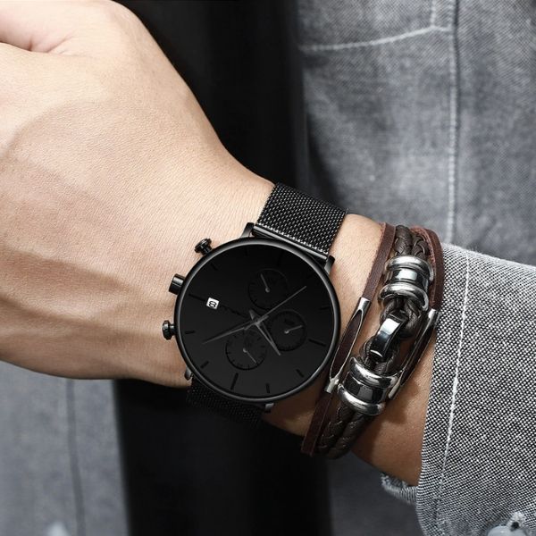 Man wearing black Cazonia Dress Minimalist Watch with black markers on wrist