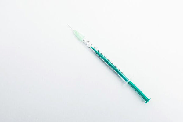 An image of a syringe of Kybella on a white background