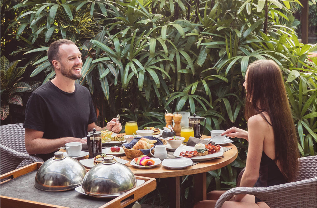 A couple having breakfast at Jamahal Private Resort in Bali