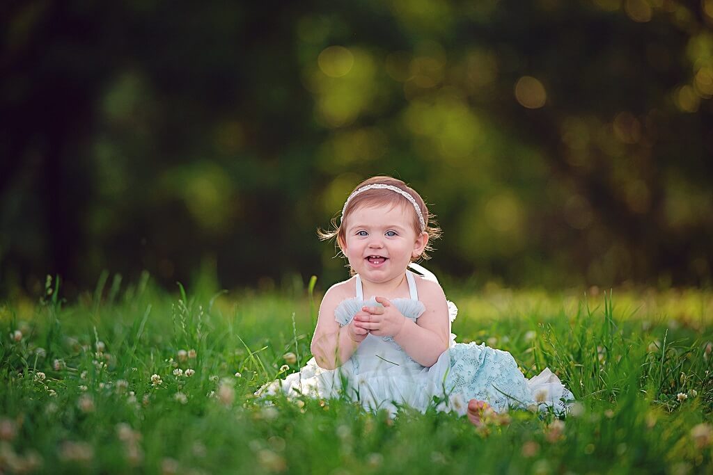 All in Focus Action added to photo of an infant in a field 
