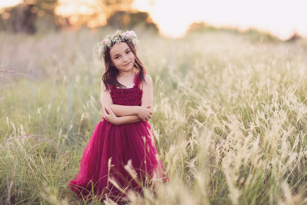 Pastel Dreams Favorite Photoshop Action Combo added to photo of a young girl in a field 