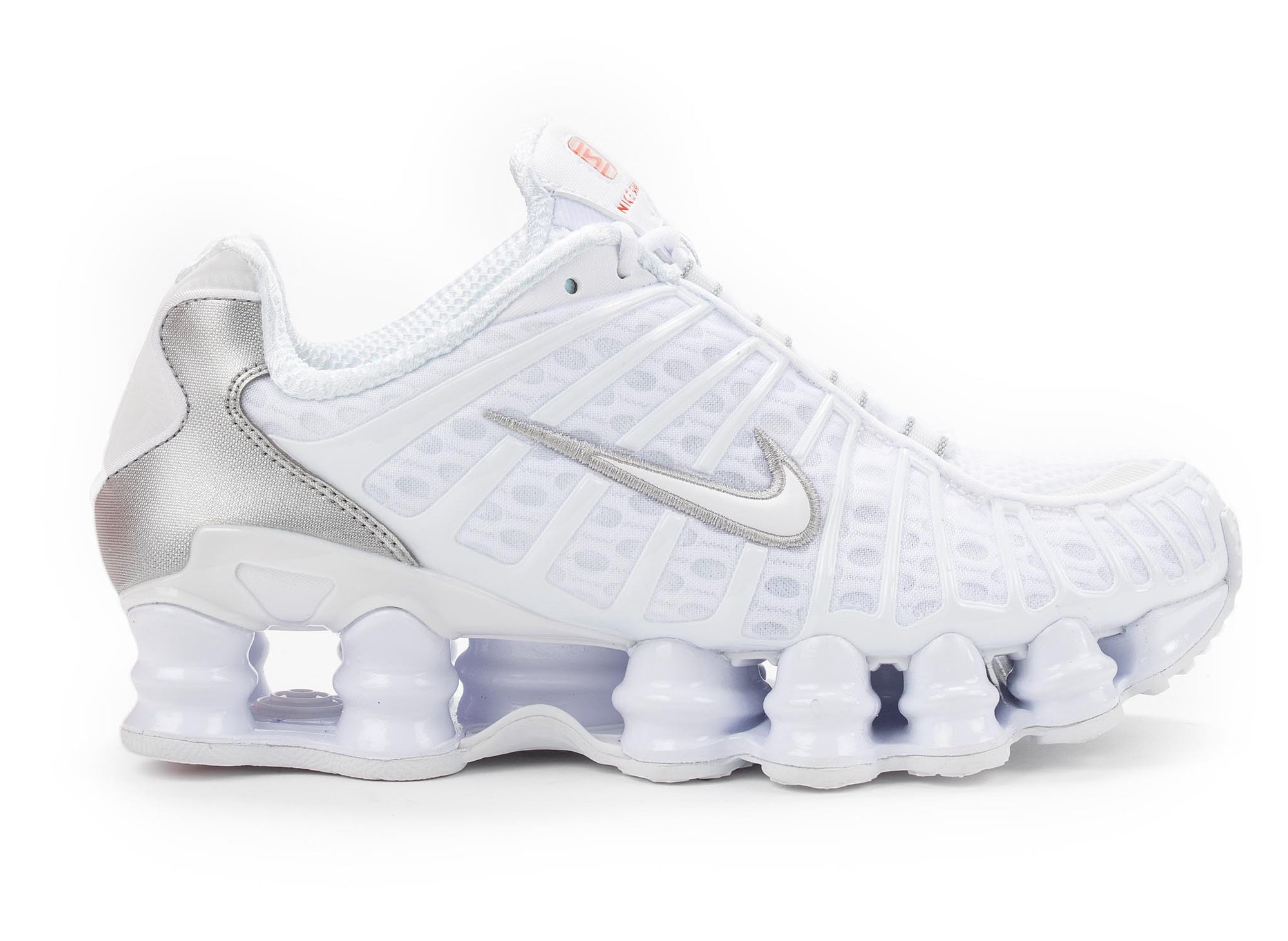 white and silver shox