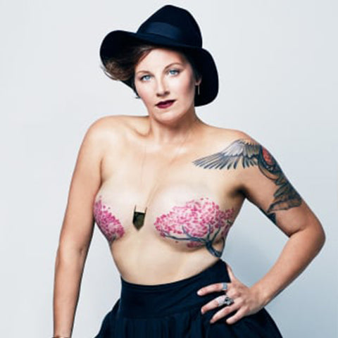 CEO Dana rocking her Mastectomy tattoos over both of her breasts