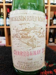 The earliest labels show the rolling hills, river and young, untrellised vines from the hill overlooking the vineyard.