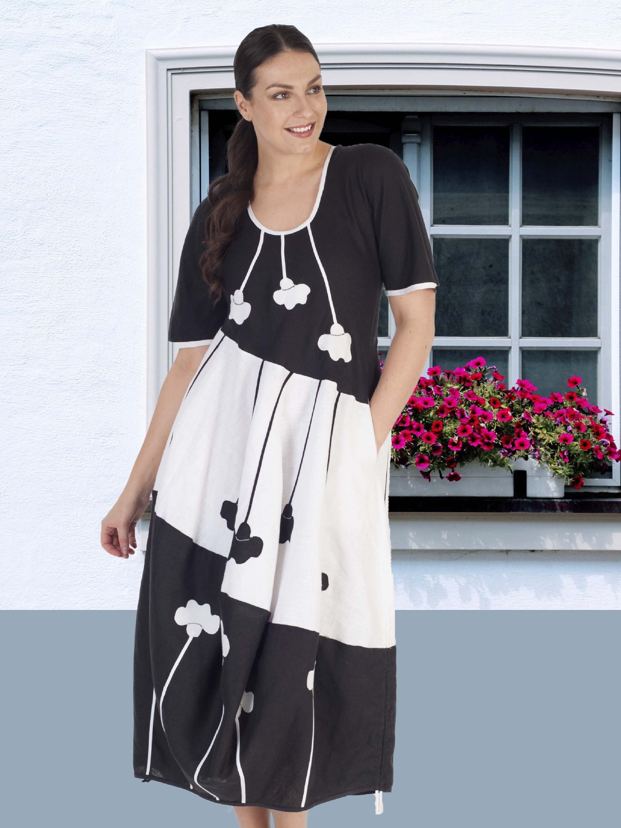 Black Dress with Flower Placement