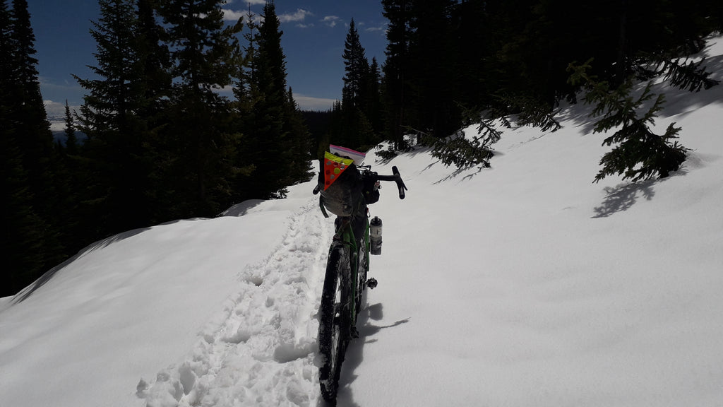 Josh's bike on a snowy Colorado Mountain