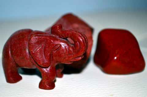Red jasper elephant and tumbled stone