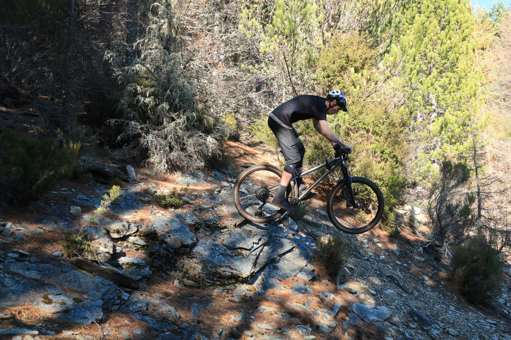 Riding some rocks on the way back up