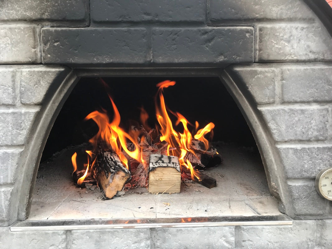 How to light a wood fired pizza oven