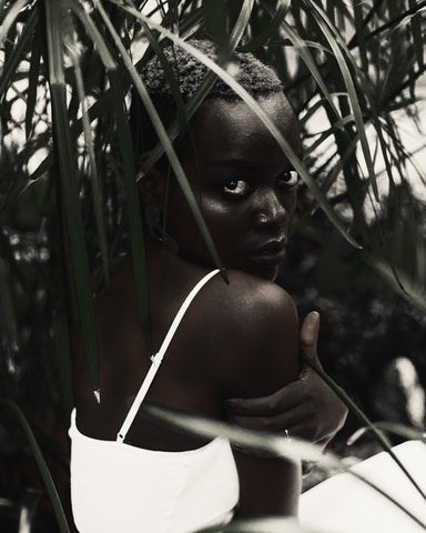 Black model in white dress- Tease Lush Accessories