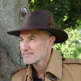olney wax explorer brown summer rain hat on man