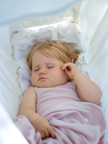 sleeping baby in merino sleepwear