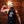 Muscular bearded man flexing while wearing seahorse skeleton tank top in black
