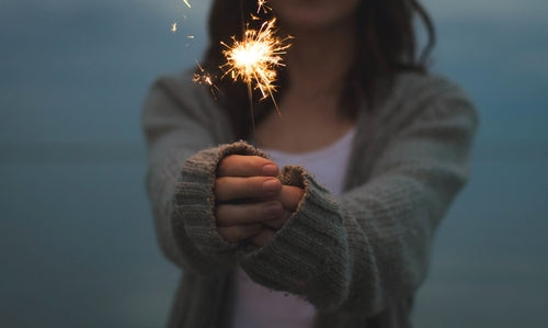 Girl holding sparkler
