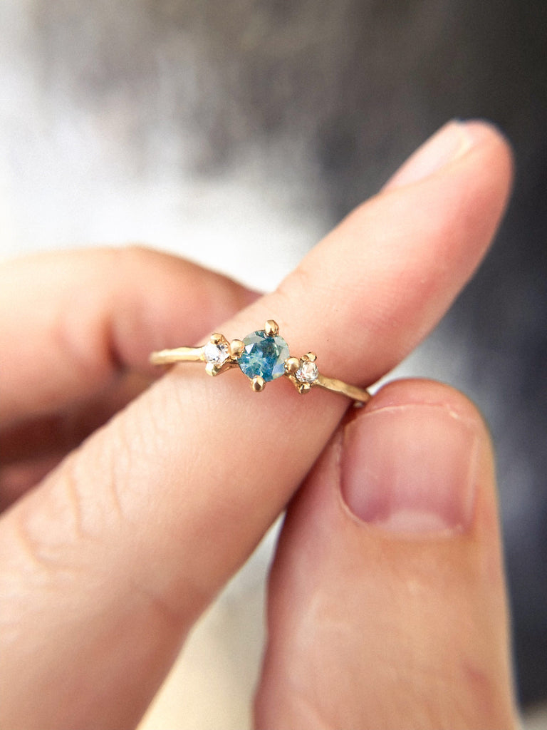 teal blue montana sapphire rings in 14k fairmined gold