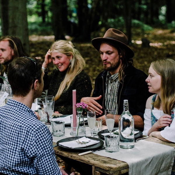 Guests enjoy a Midsummer Feast in the Kentish countryside.