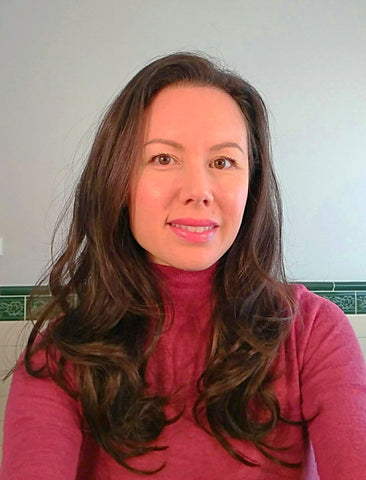 brunette with long brown hair after shot wearing lushiere clip in hair extensions in oomph chocolate brown trimmed to 16" length